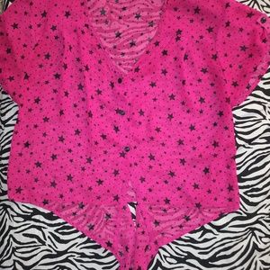 Women's fusia button down blouse.